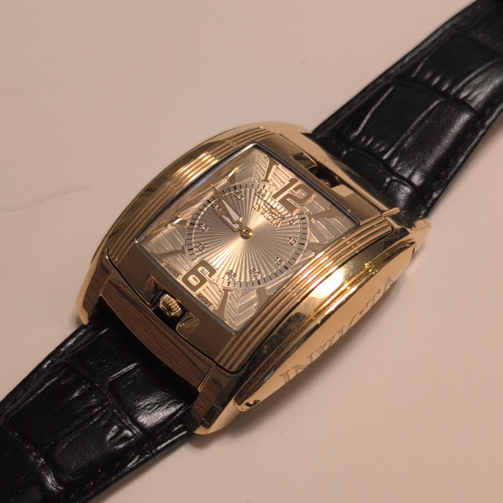 Invicta 22390 Quartz Rectangle Gold Tone Case Black Dial Leather Strap 50m