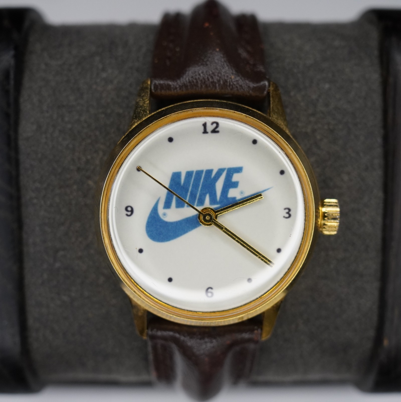 Vintage 1990s Nike Swoosh Logo Men’s Quartz Watch Gold Tone White Dial