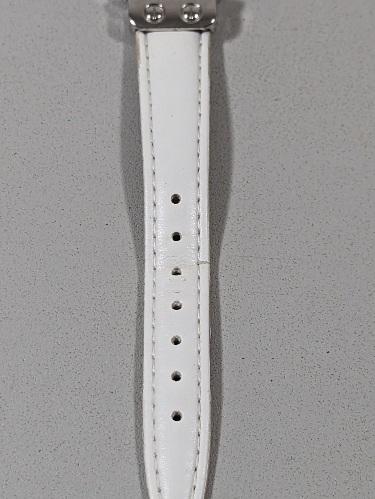 Embassy Womans White Pearlized Dial Silvertone Round Case White Band Watch 7.5in