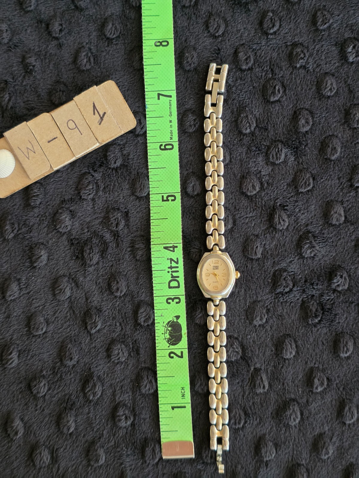 Item #W91 Faded Glory 7.5 in band .75in face Watch