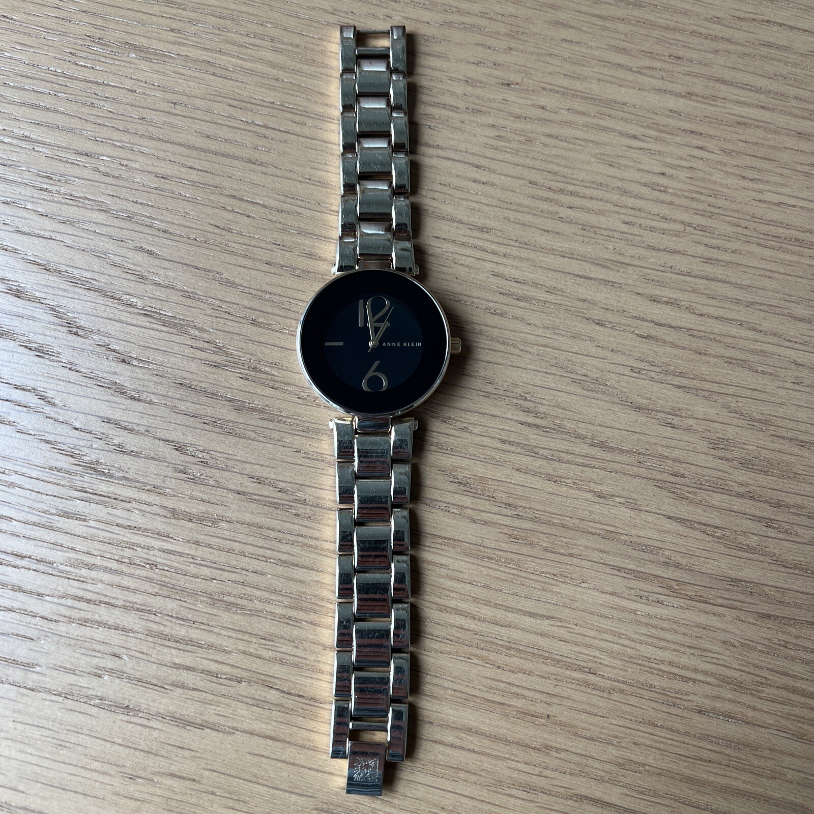 Anne Klein Gold Tone Black Dial Water Resistant 100 Feet Women’s Watch AK/1074