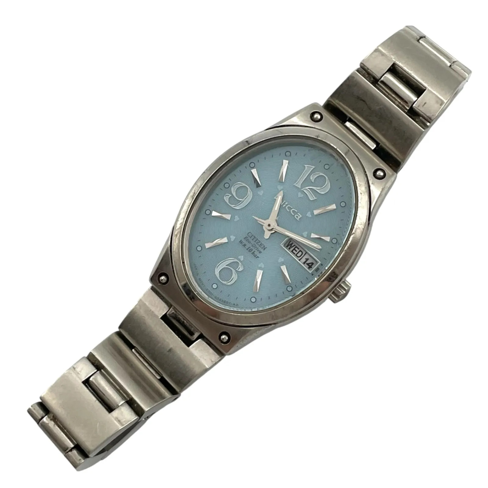 Working CITIZEN Wicca E001-S027110 Solar Women’s Analog Day-Date Oval 3-Hand
