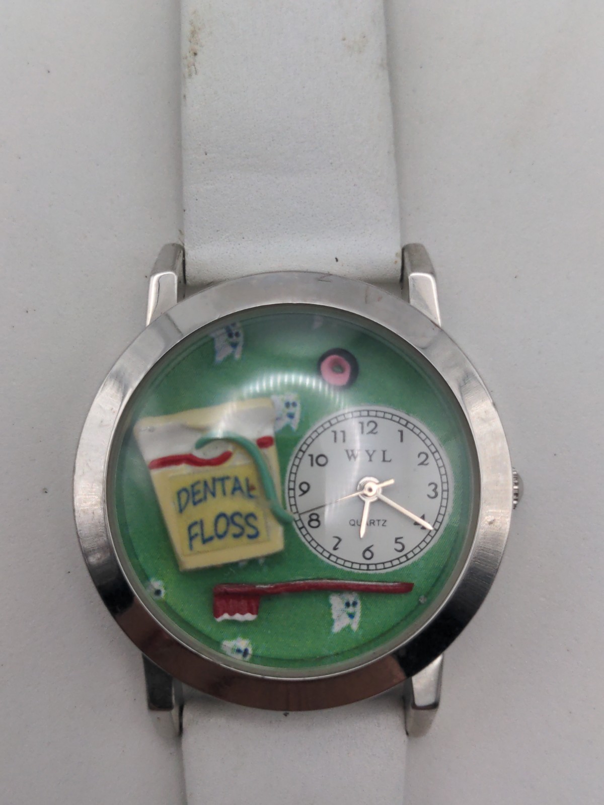 WYL Womens Watch Dental Floss Dial White Leather Novelty New Battery