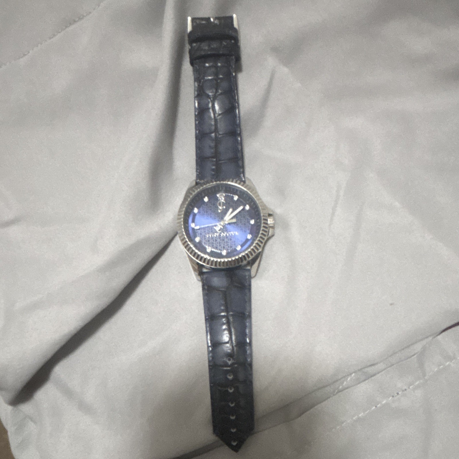 Juicy Couture Women’s Analog Quartz Watch Blue Dial Silver Case Blue Leather