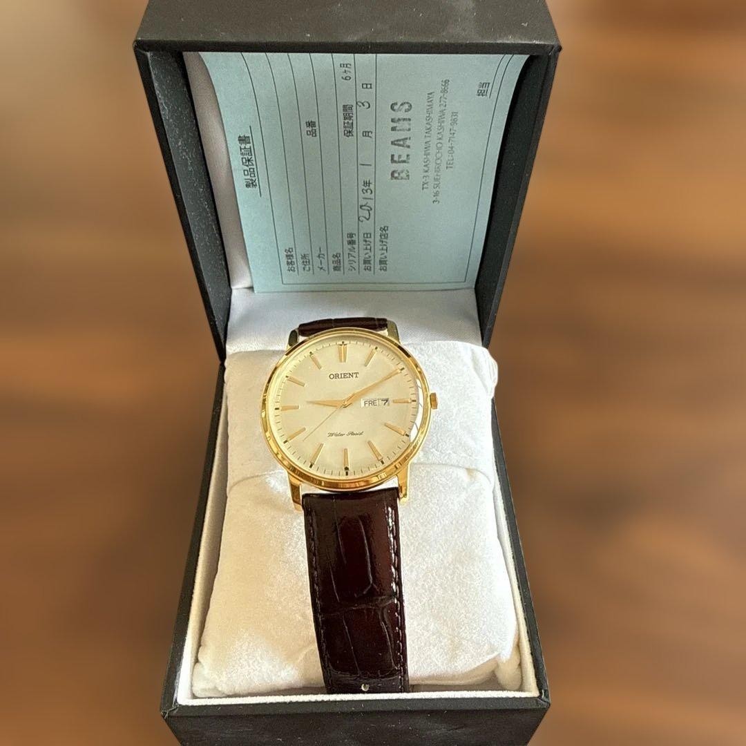 Orient Classic Capital UG1R-A0-A Gold Quartz Day Date Leather Men’s Dress Watch