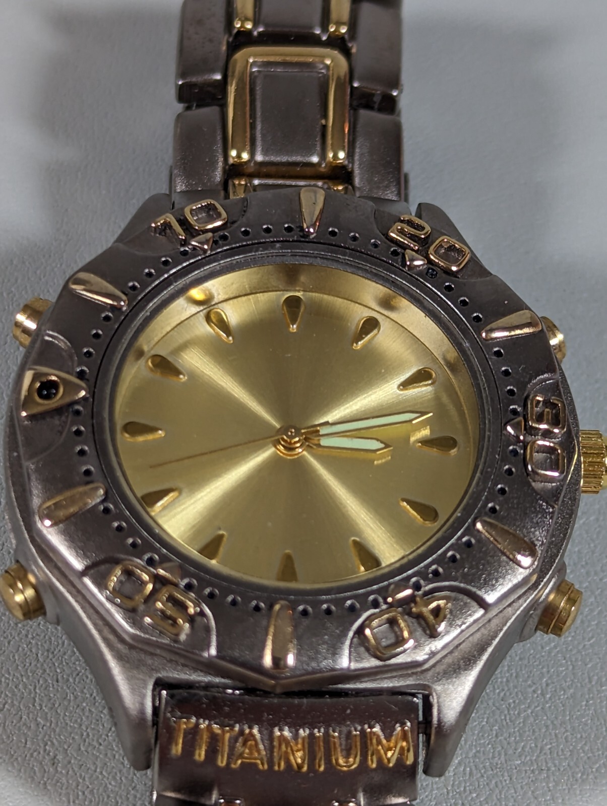 Gold Tone Dial Two Tone rotating Bezel Titanium Stainless Steel Band Watch 7.25i