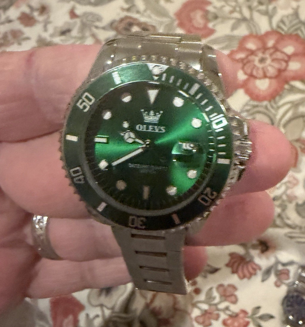 OLEVS Men’s Quartz Date Watch Green Dial Unidirectional Bezel Steel Bracelet