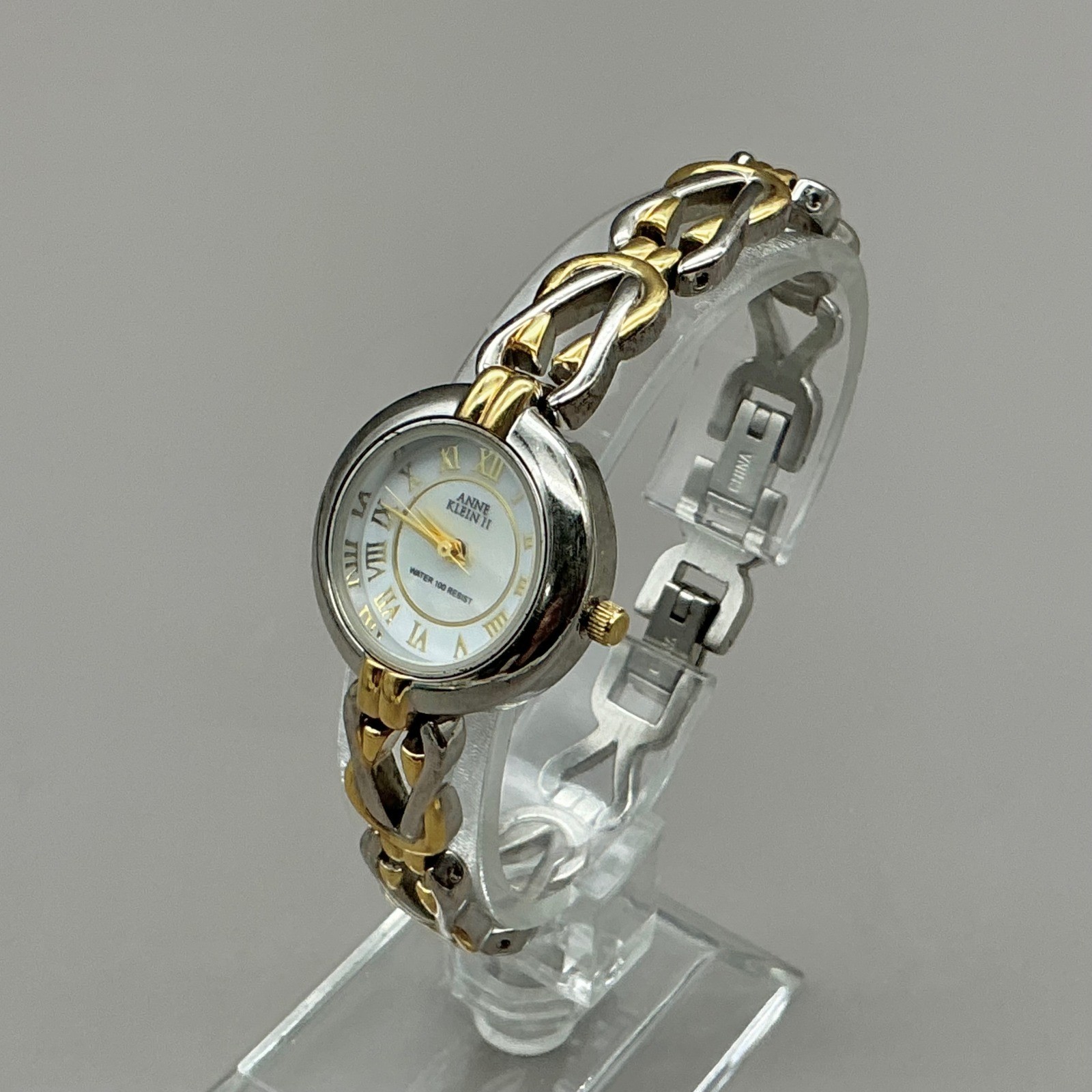 Anne Klein II Watch Womens Silver Gold Tone MOP Dial Roman Numeral NEW BATTERY