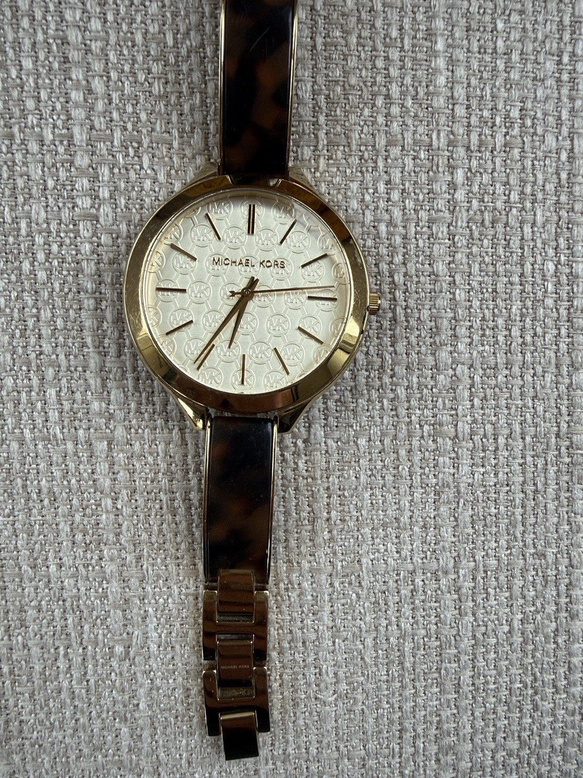 Michael Kors Gold Tone Analog Dress Bracelet Watch Logo Dial White Stick Indexes