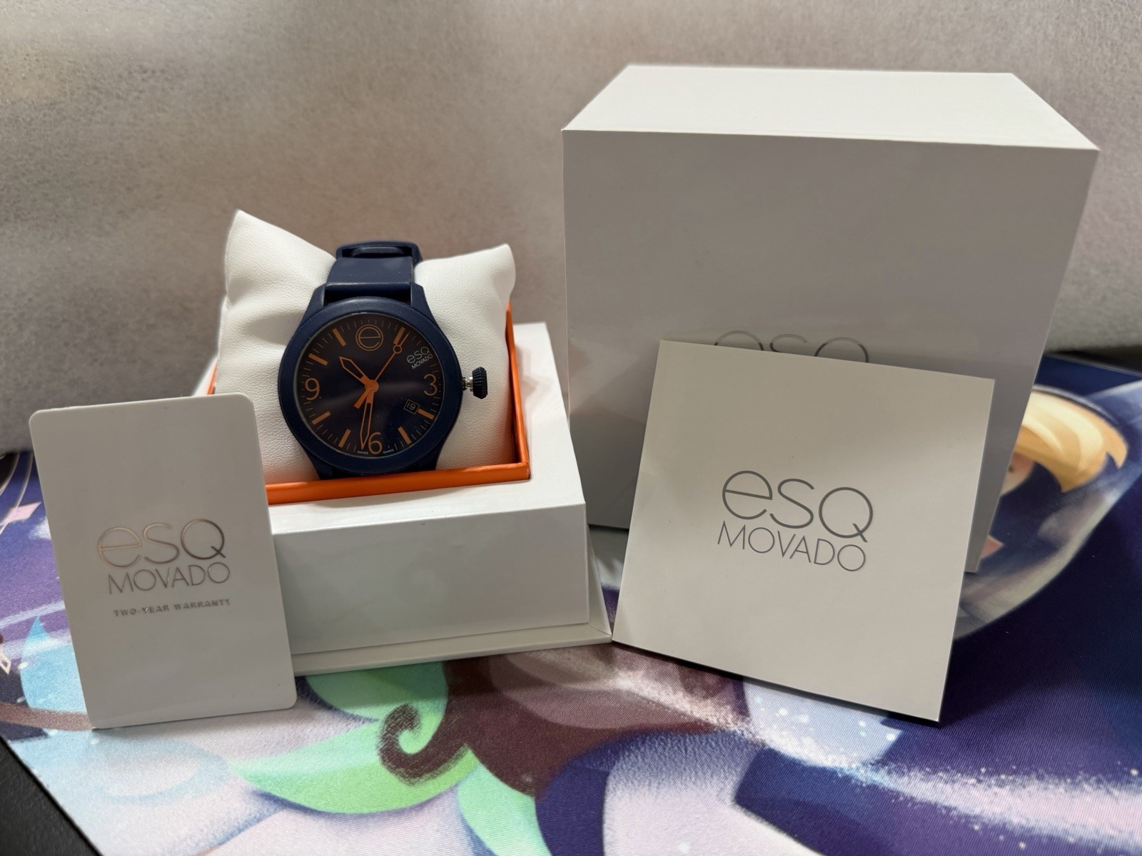 Esq Movado Men’s Watch Blue With Orange Silicone Band needs new battery
