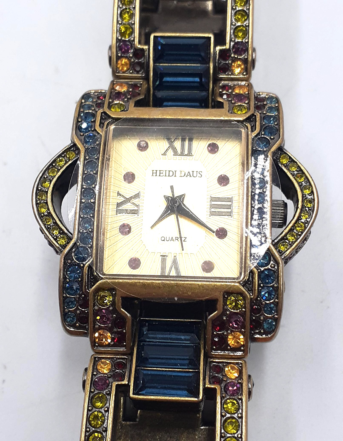 Heidi Daus B7089 Watch Blue Baguette Crystal Band Fold Over Clasp Antique Gold