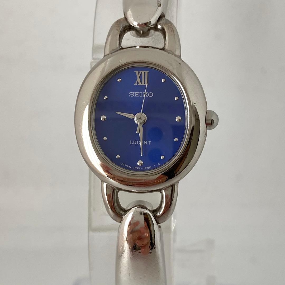 Working SEIKO LUCENT wristwatch, blue dial, oval shape, accessory watch.