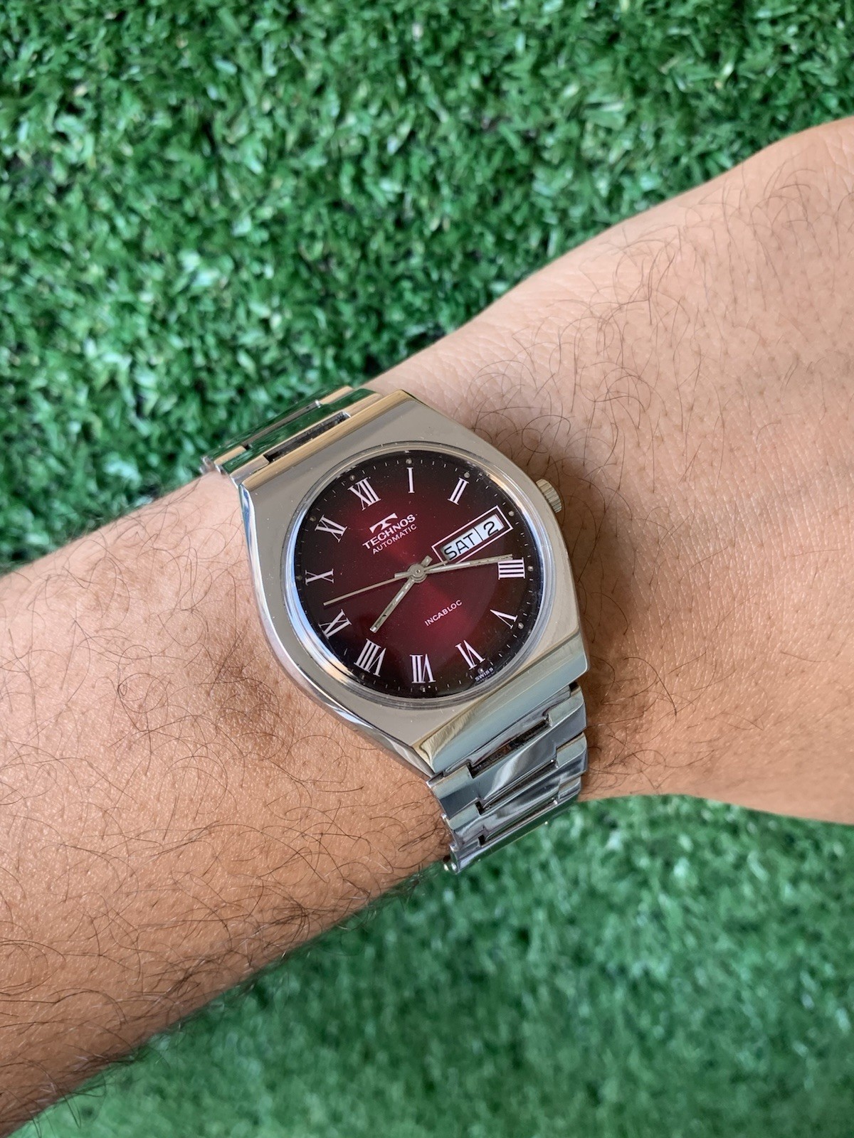 Technos Men’s Automatic Red Dial Stainless Steel Watch 1970s Vintage Swiss Made