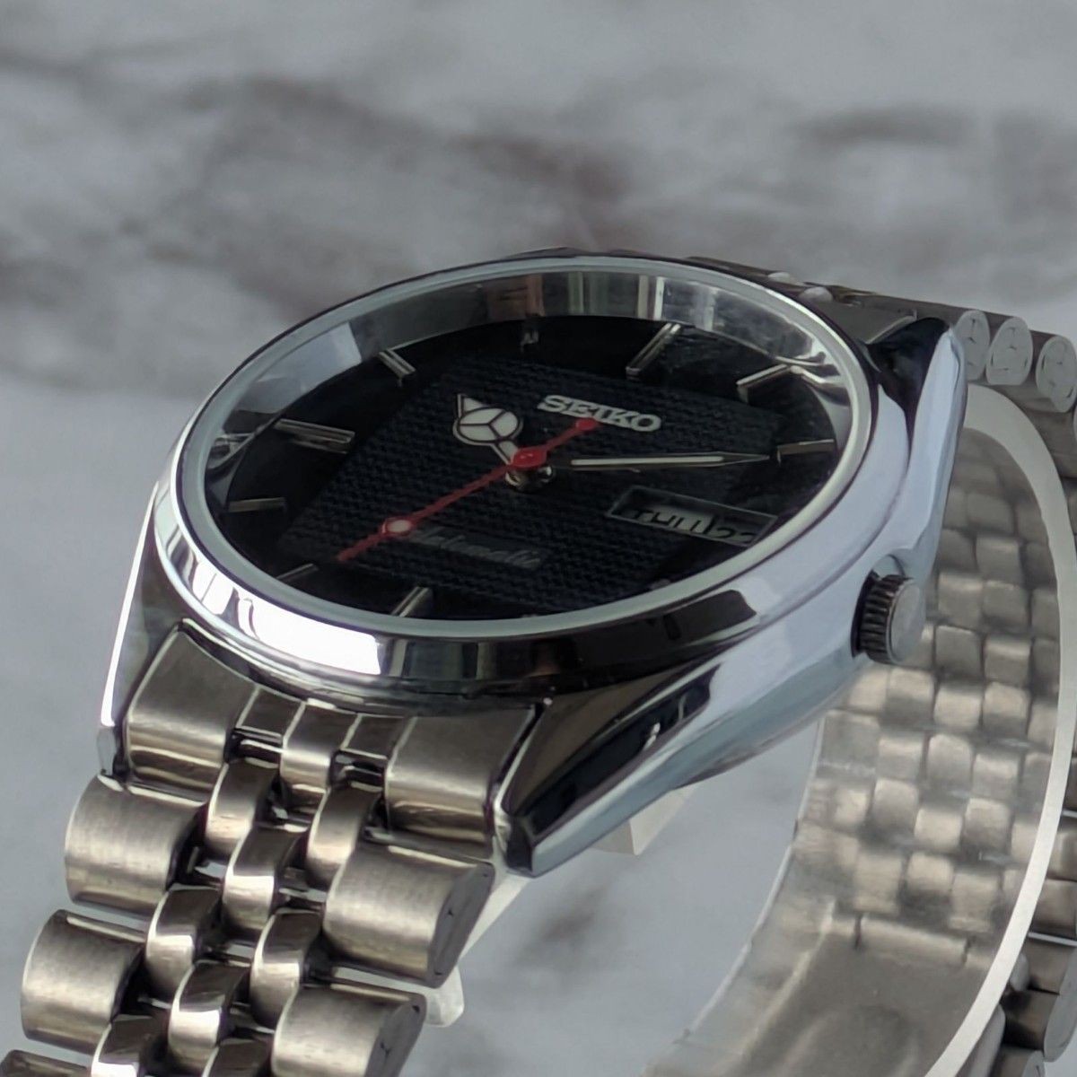 Working SEIKO Automatic 80s Vintage Black Dial Bar Index Ripple 3 Hands Skeleton