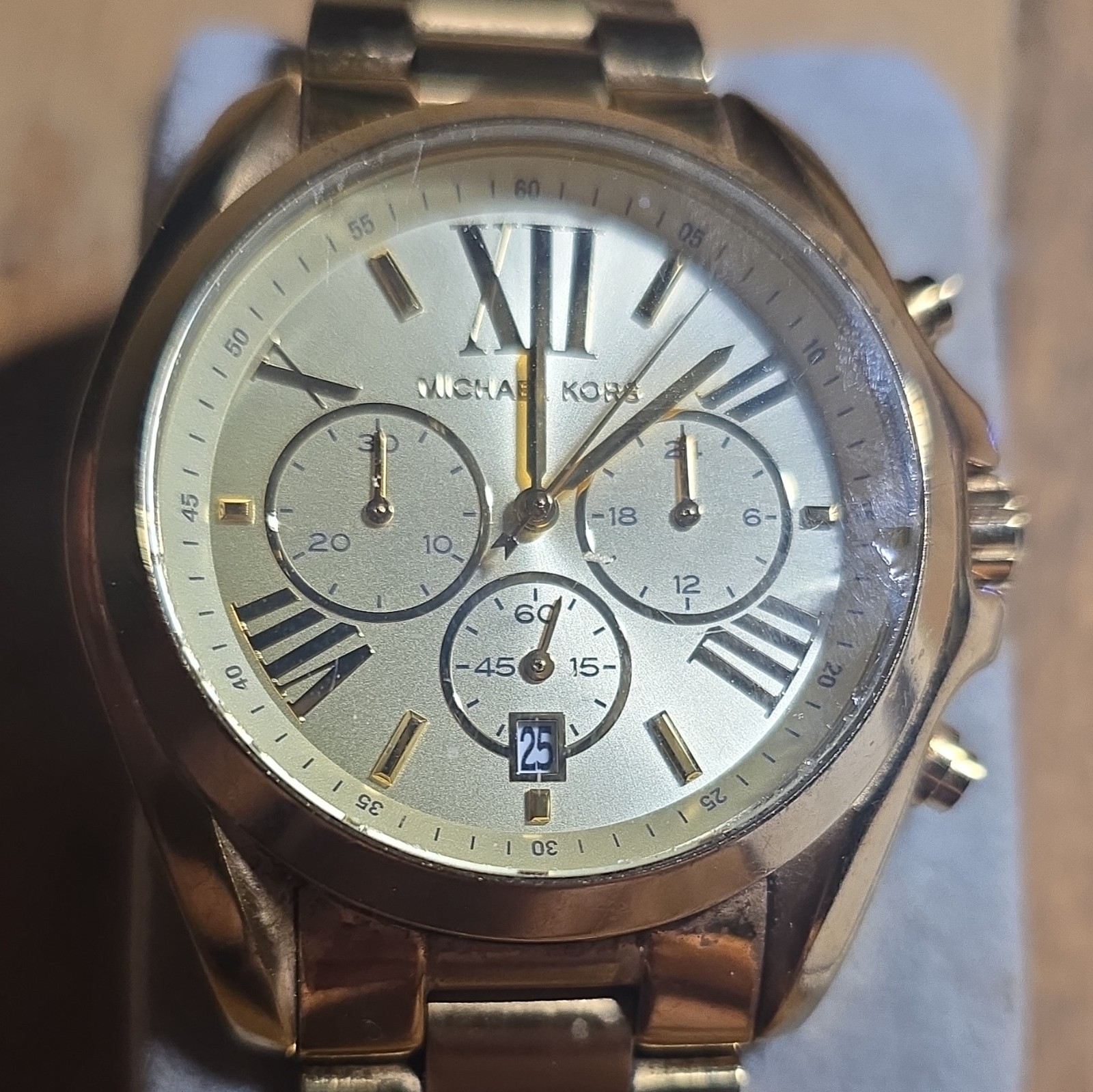 Michael Kors men’s Quartz Chrgraph Date Gold Bracelet Silver Roman Dial