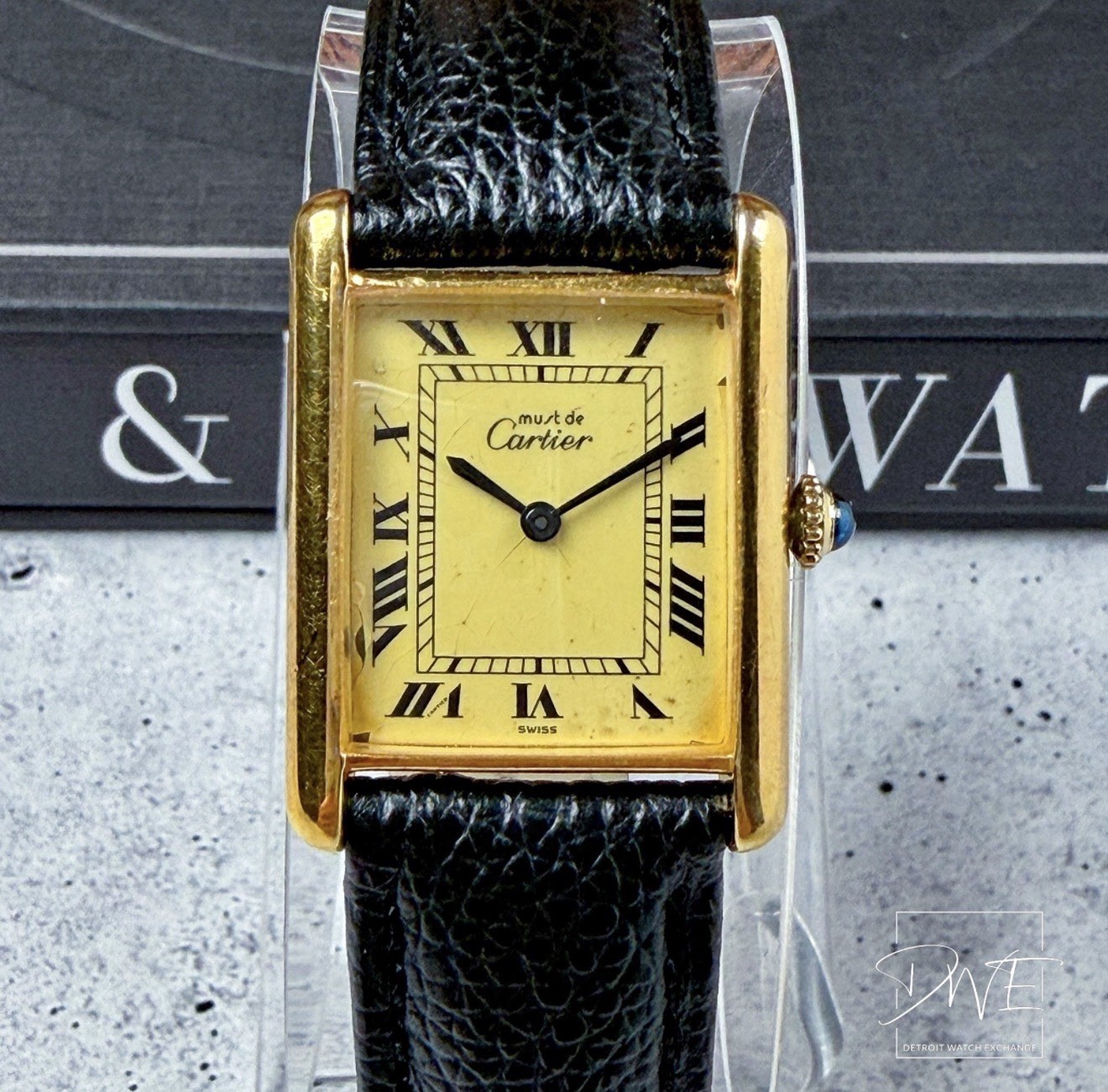 Cartier Must de Cartier Tank Swiss Manual Gold Dial Black Leather