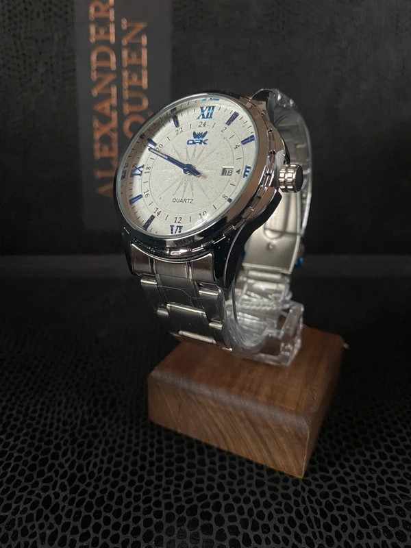 Classic Luxury Silver Quartz Watch with Blue Accents