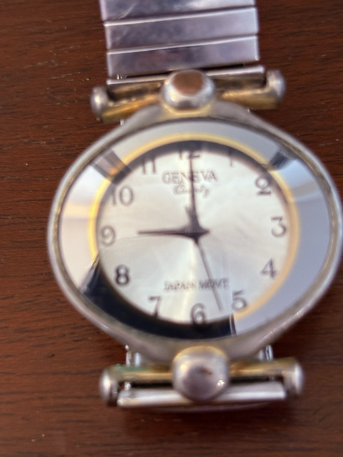 Geneva Women’s Analog Quartz Dress Watch White Dial Arabic Silver Bracelet
