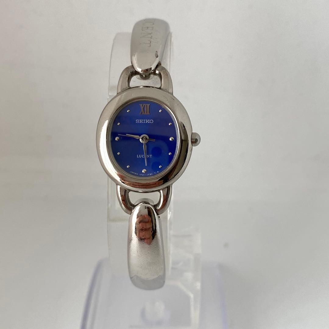 Working SEIKO LUCENT wristwatch, blue dial, oval shape, accessory watch.