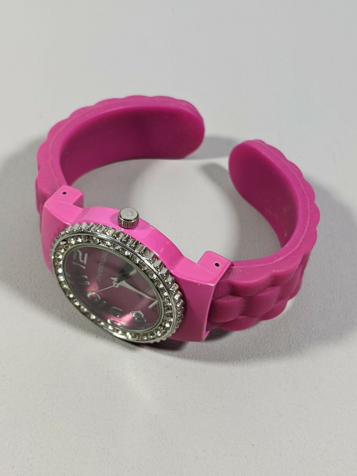 Avenue Pink Dial Crystal Accent Bezel Round Case 34.4 mm Open Cuff Band Watch