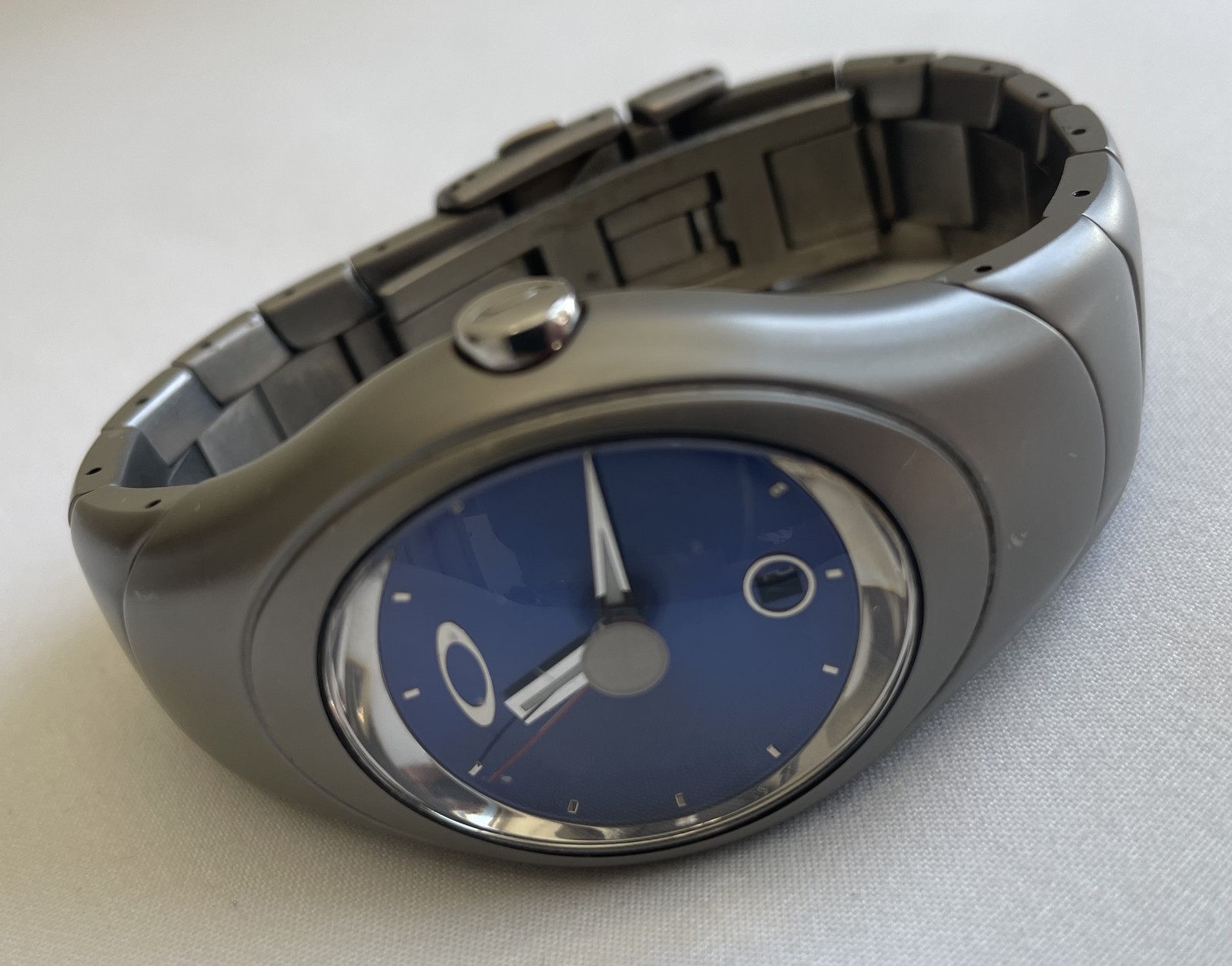 Oakley Time Bomb Icon Titanium/Blue – Titanium – NEAR MINT