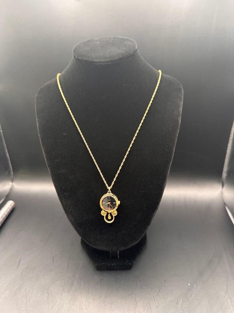 Citizen quartz necklace with watch