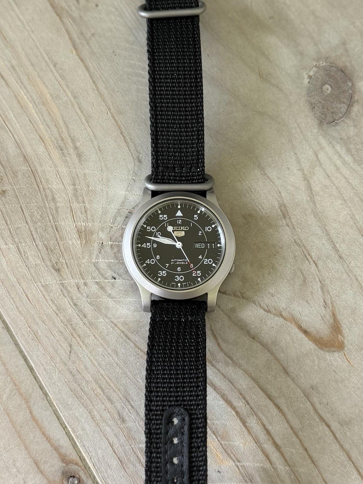 Seiko 5 SNK809 Automatic Day/Date Black Dial Black Nylon Strap