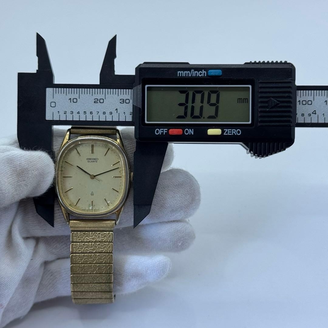 Working condition SEIKO quartz watch, new battery, oval gold case, unisex.