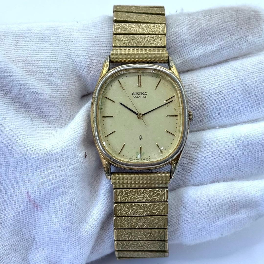 Working condition SEIKO quartz watch, new battery, oval gold case, unisex.