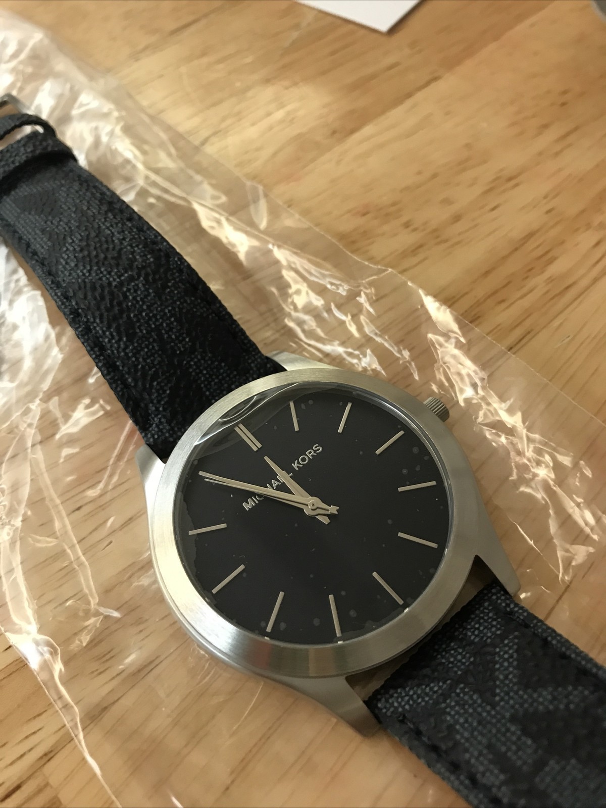 Authentic unisex Michael Kors slim Quartz watch brand new with tags and box