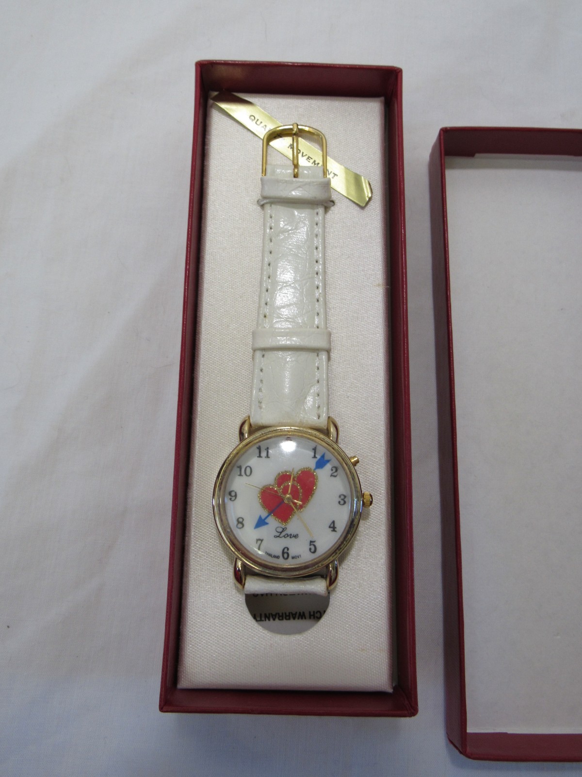 Vintage Gold Tone Watch with White Band From Filene’s Department Store