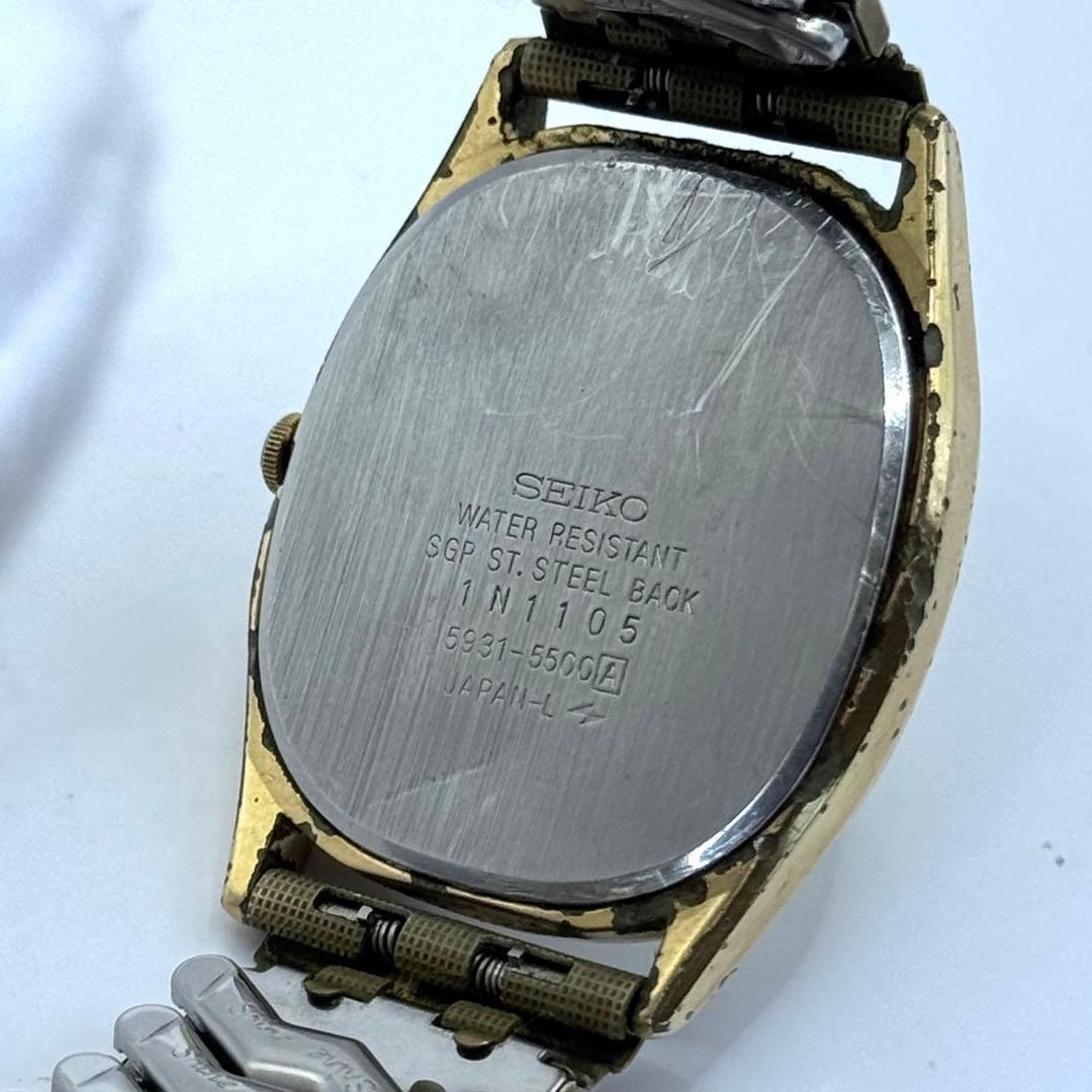 Working condition SEIKO quartz watch, new battery, oval gold case, unisex.