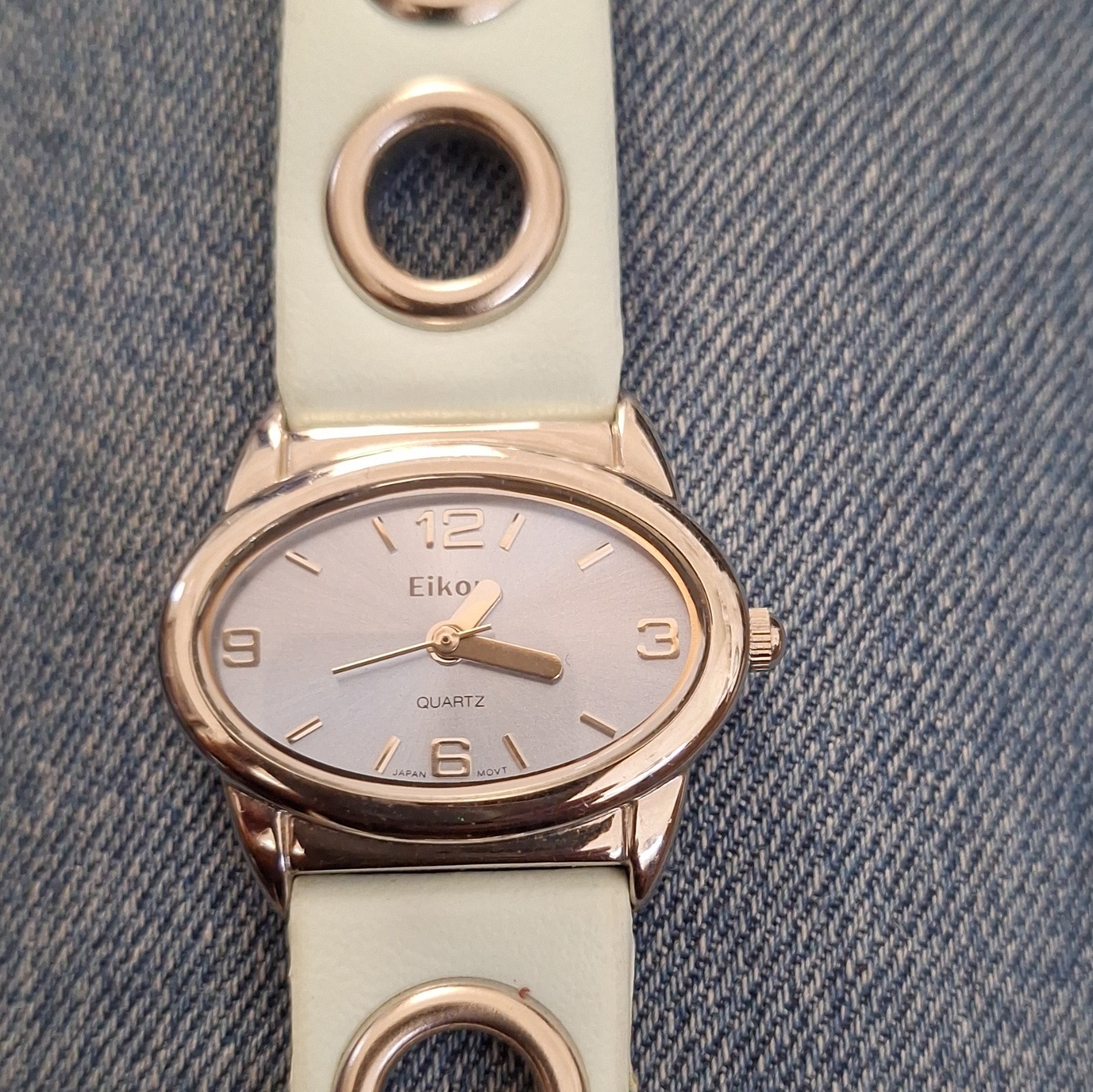 Eiko Women’s Quartz Analog Oval Wristwatch Gold Tone Blue Dial Blue Strap