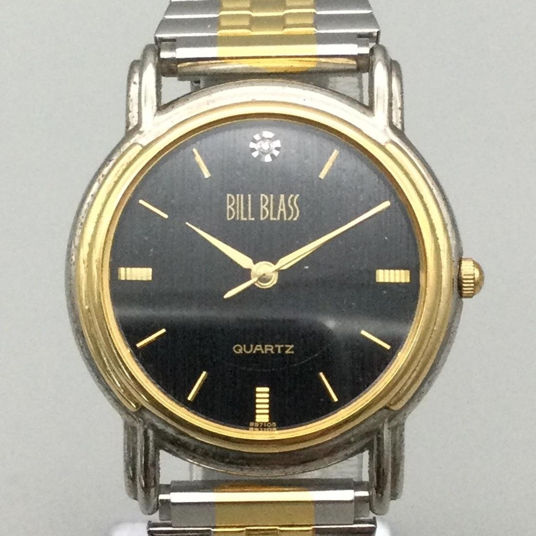 Bill Blass Mens Watch 34mm Black Dial Two Tone Stretch Band Dress New Battery