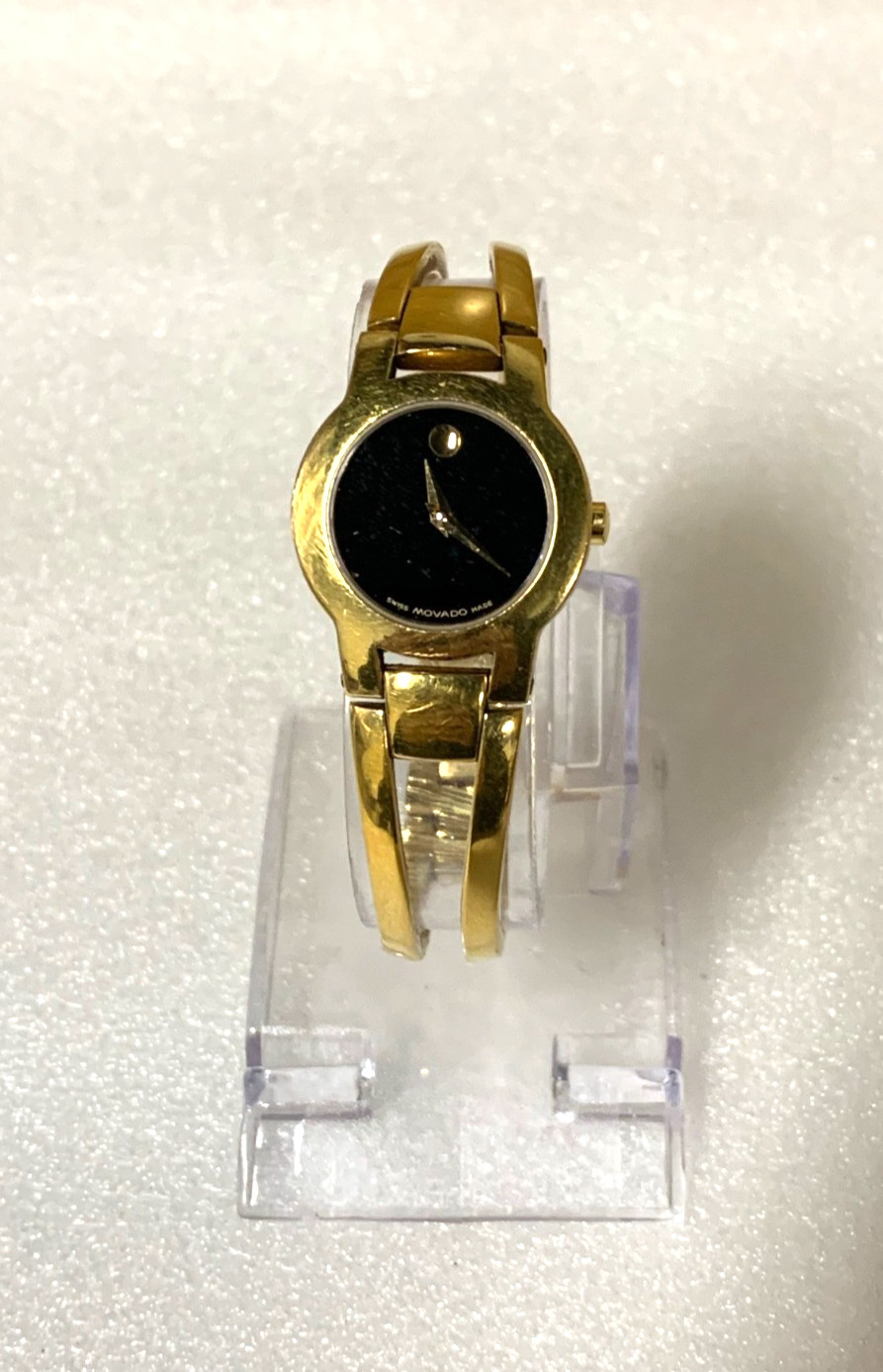 Movado Amorosa Ladies 7″ watch gold tone black dial 88 E4 1842 – PRE OWNED