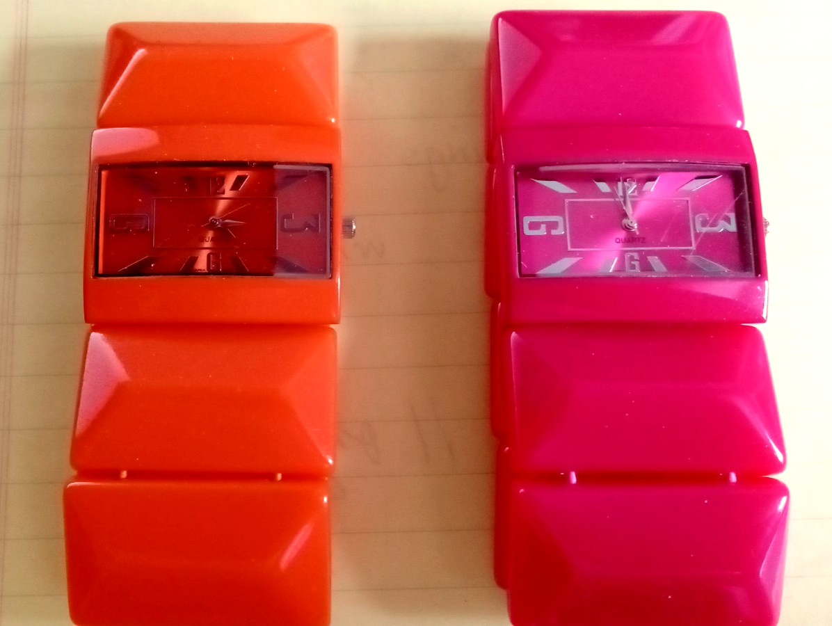 2 — #PN-70 Quartz Women’s Watches —- 1-ORANGE 1-PINK Accutime Watch Corp