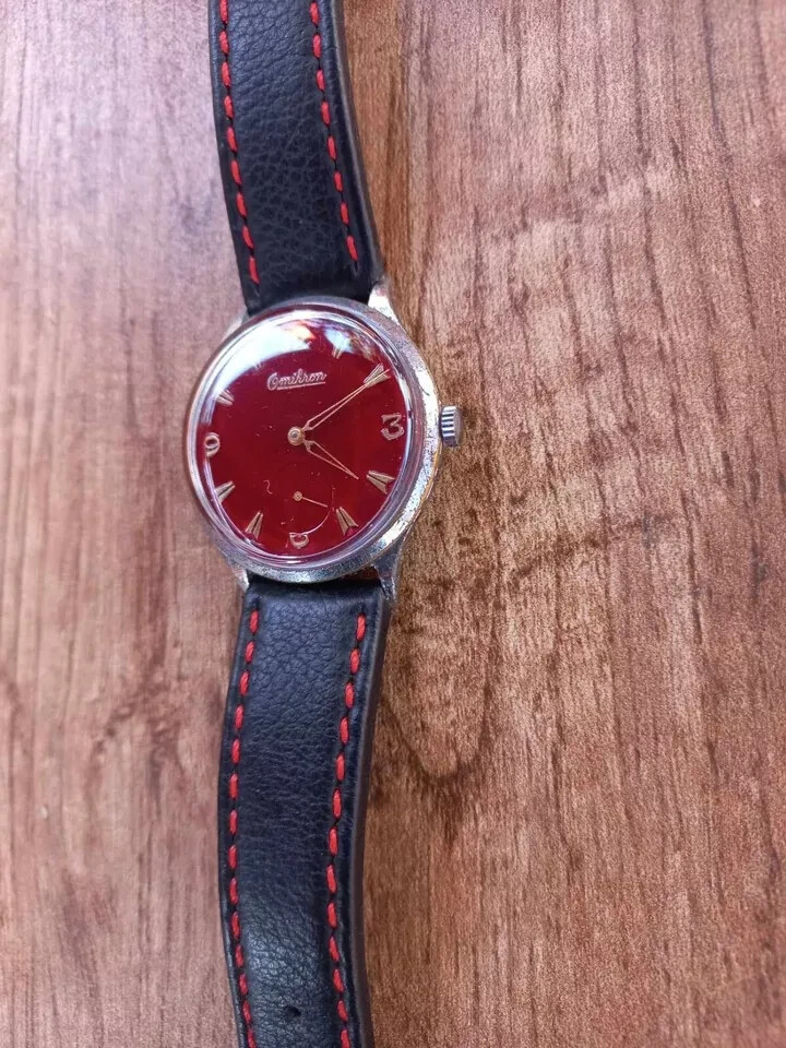 Cornavin vintage Swiss mechanical men’s watch with rare dark red dial