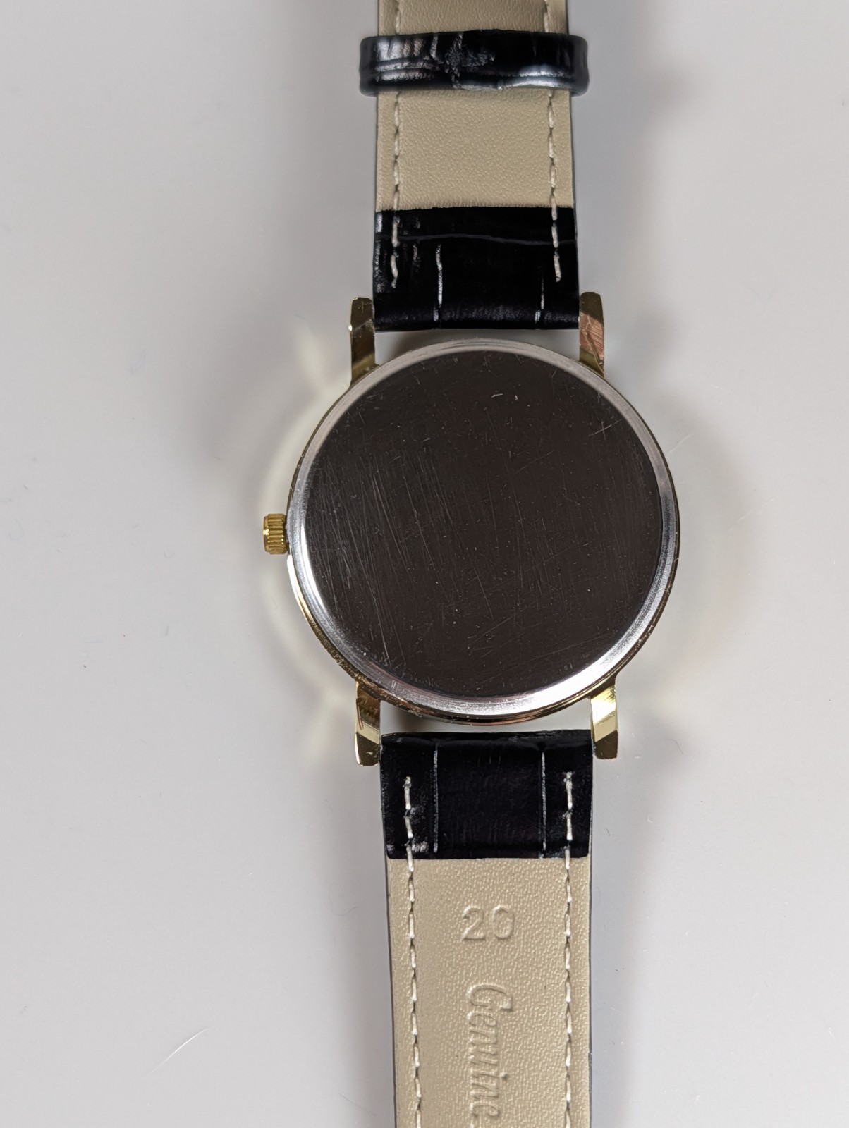 Elephant watch with flower pattern and dot indexes black leather band