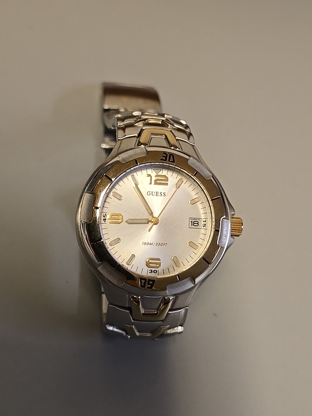 Guess Waterpro 100M/330FT Mens Wrist Watch Gold And Stainless