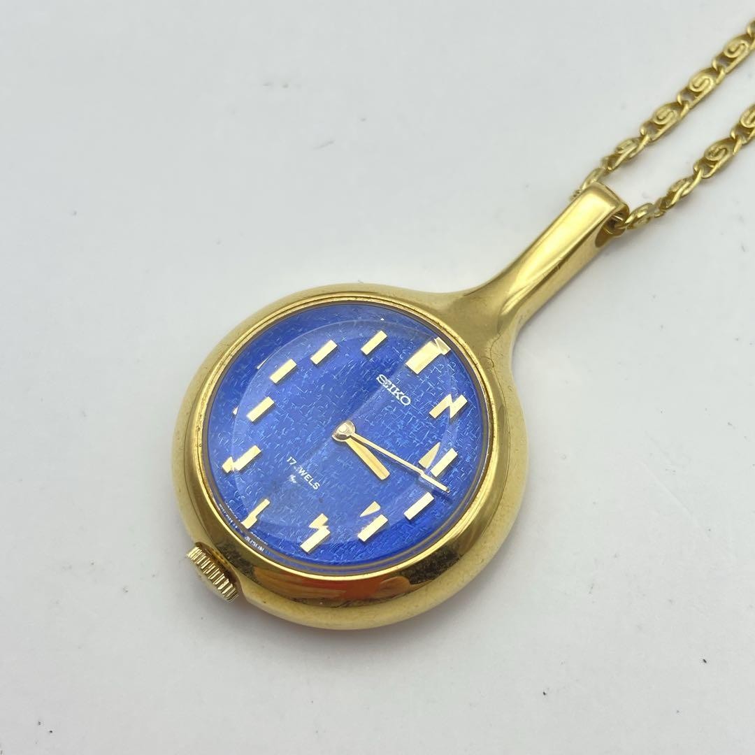 Seiko pendant watch, blue dial, manual winding, working, gold.
