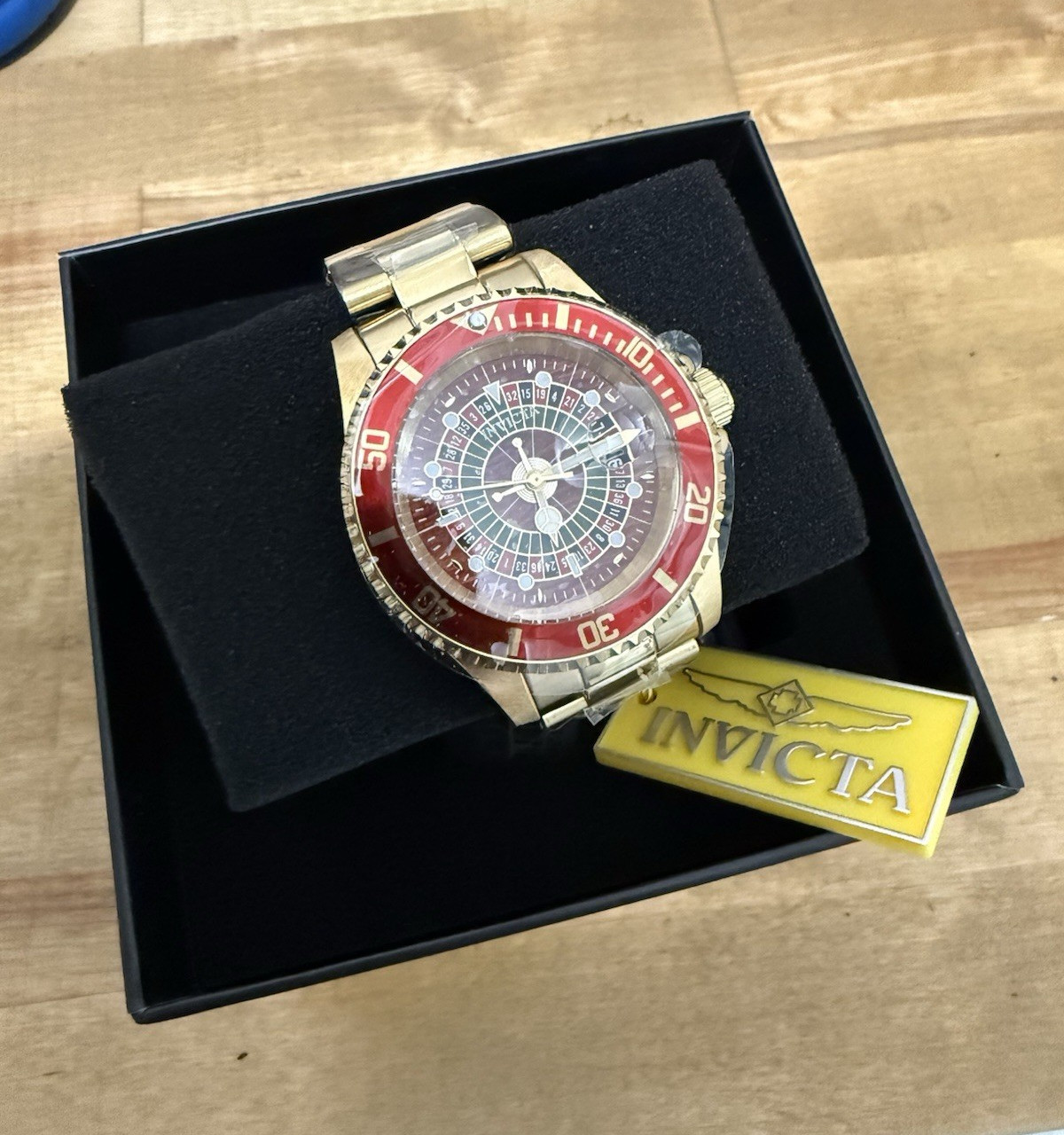 Invicta Roulette Quartz Analog Red Bezel Gold Steel 48-52mm 100m w/ Box