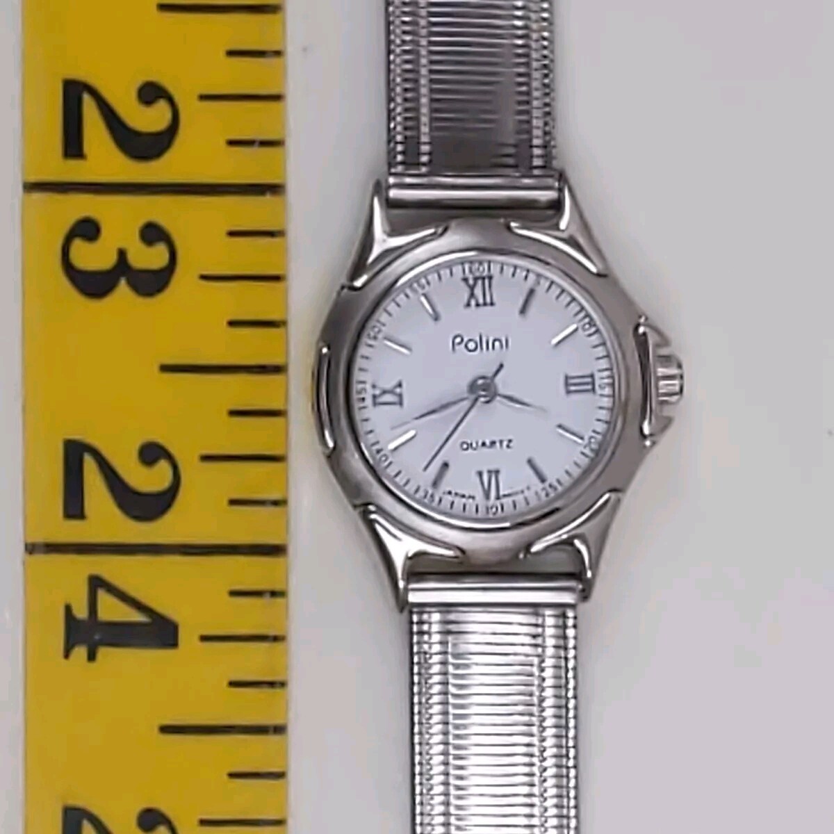 Polini Quartz Silver Tone Women’s Dress Watch Roman Numerals Metal Band Classic