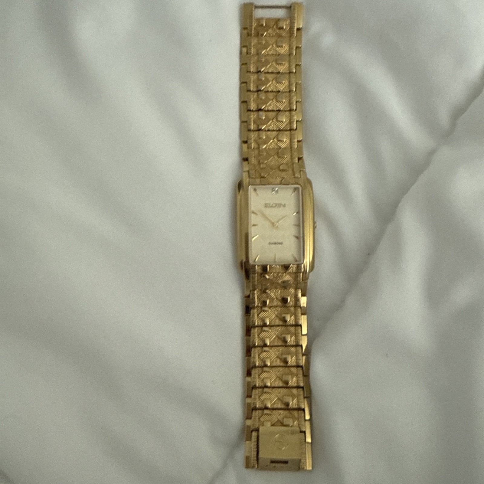Vintage Elgin Men’s Gold-Tone Tank Watch with Diamond Accent – Model FG286NB
