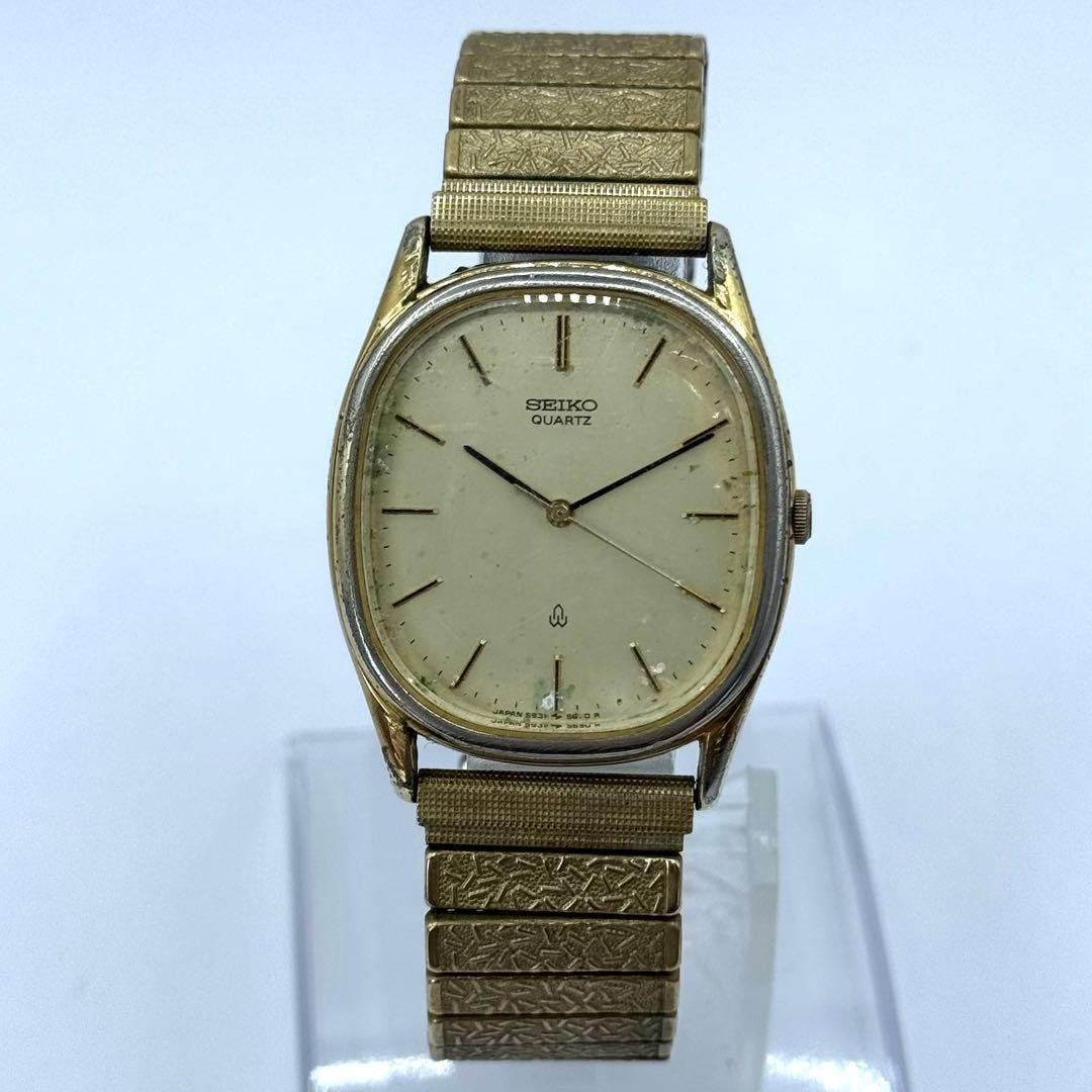 Working condition SEIKO quartz watch, new battery, oval gold case, unisex.