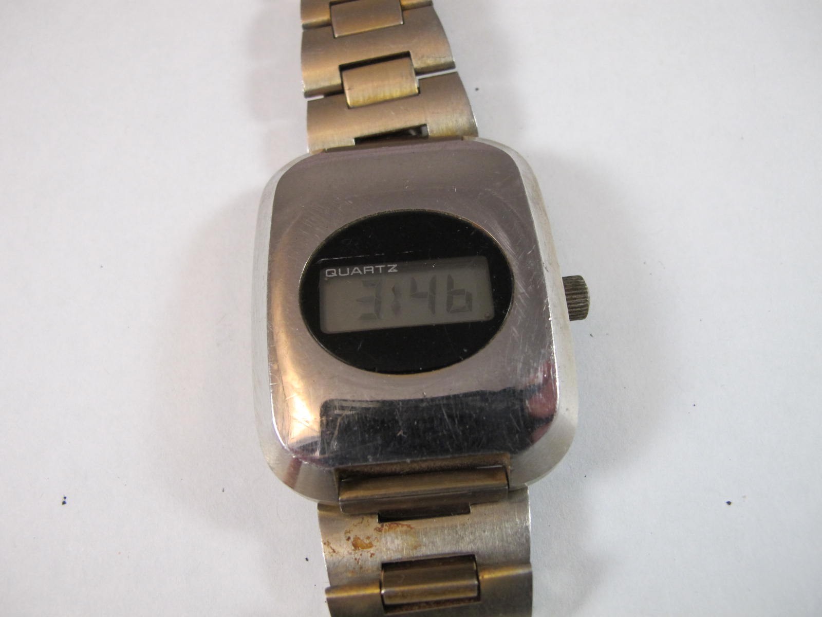 EPSA OPTEL MENS VINTAGE EARLY LCD LARGE CASE IN WORKING CONDITION OVAL DIAL