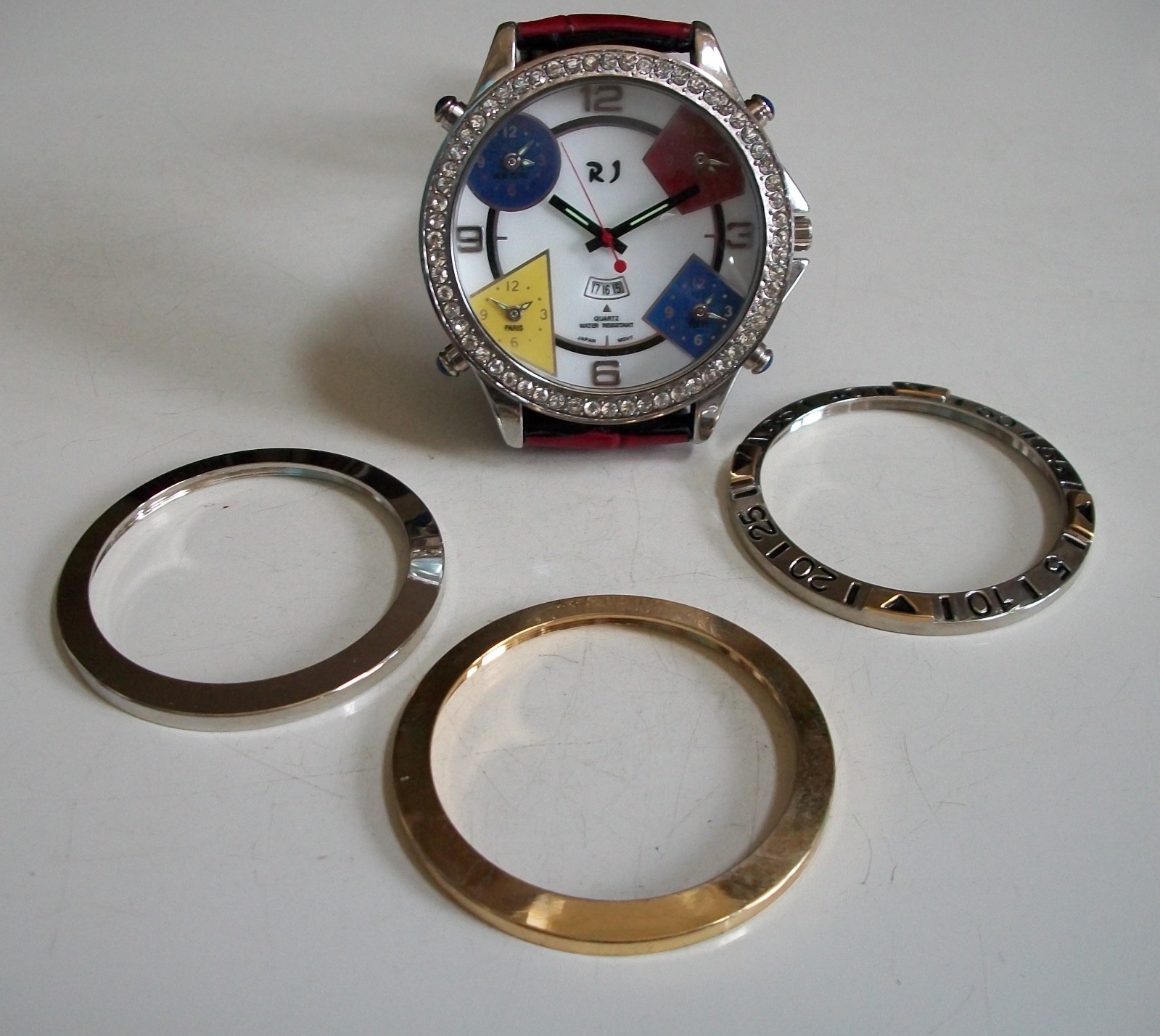 RJ CZ/Plain Bezel 5 Time Zone Date Men’s Fashion Watch With Pouch & Extra Bezel