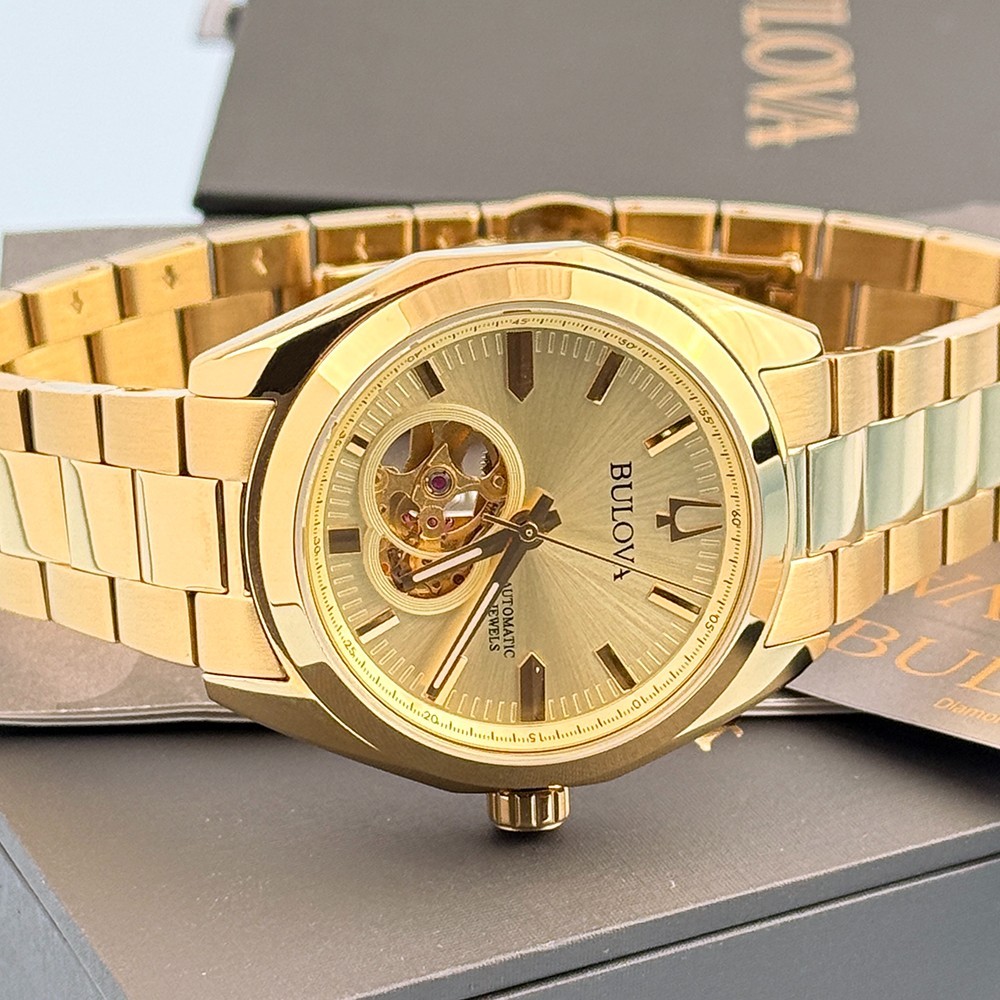 Men’s Bulova 97A182 Surveyor Champagne Dial Gold-Tone Stainless Automatic Watch