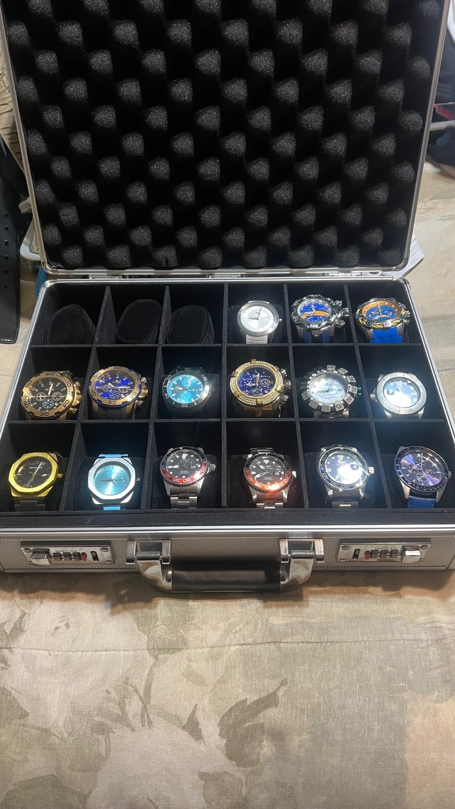 Invicta watch lot of 15. Watch Collection. Watches (Invicta,Mancini,Puma)