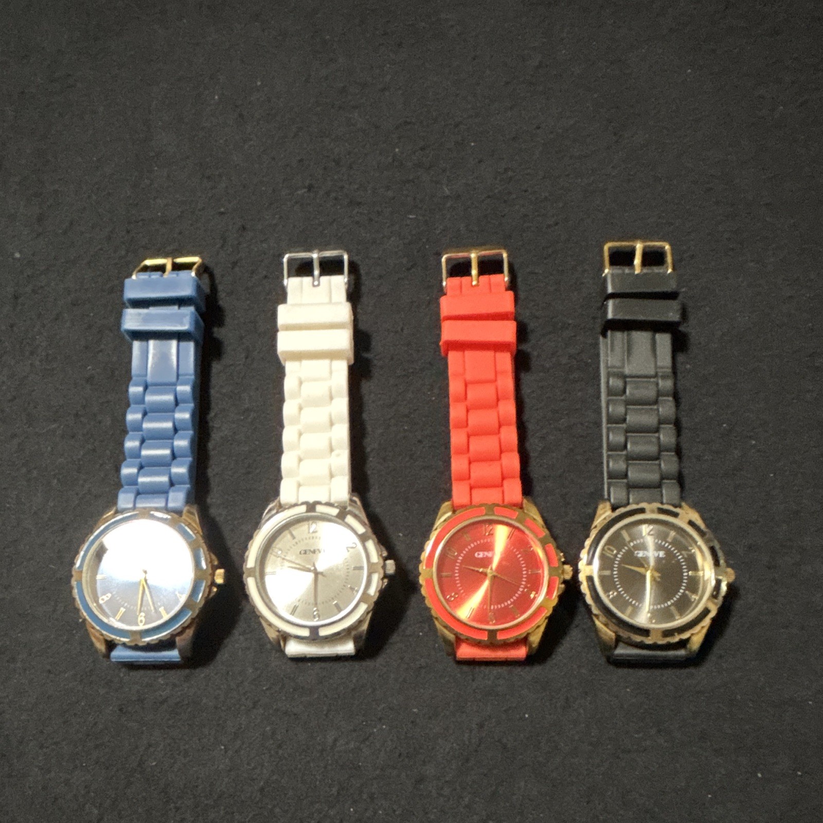 Geneve Lot of 4 Round Analog Watches Blue/White/Red/Black Rubber Straps