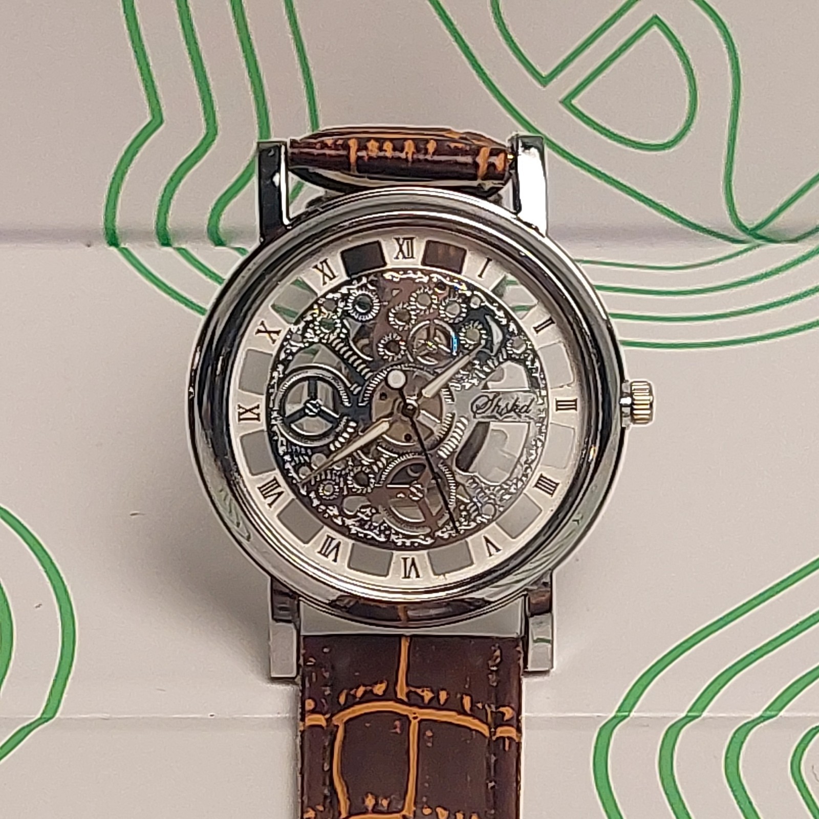 Men’s Watch Silver Skeleton Dial Roman Numerals- Brown Faux-Leather Band